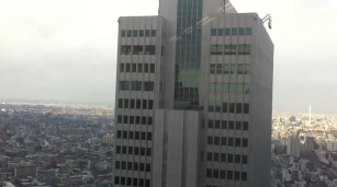 Rare shot of tall buildings vibrating due to the Japan earthquake